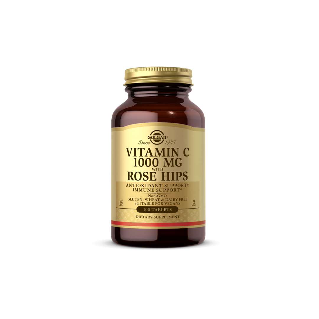 A bottle of Solgar Vitamin C 1000 mg with Rose Hips contains 100 tablets. It is labeled for antioxidant and immune support and is free from gluten, wheat, and dairy.