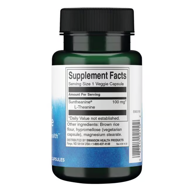 The Swanson Suntheanine L-Theanine 100 mg veggie capsules come in a green bottle with supplement facts. Known for promoting relaxation, these capsules contain brown rice flour, hypromellose (vegetarian capsule), and magnesium stearate. Derived from green tea, they support a calm mind.