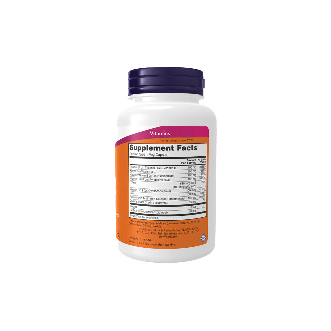 A bottle of Now Foods' Vitamins B-100 mg Complex 100 Vegetable Capsules for cardiovascular health on a white background.