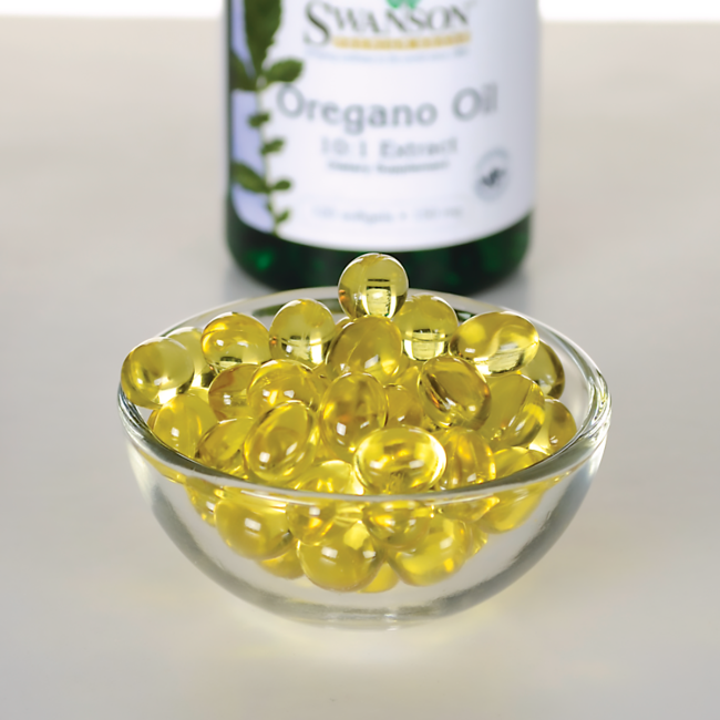 Un bol d'huile d'origan biologique Swanson - 150 mg 120 softgels à côté d'une bouteille pour soutenir le système immunitaire et la santé gastro-intestinale.