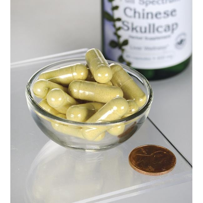 Swanson Scutellaire chinoise - 400 mg 90 gélules dans un bol avec un penny.