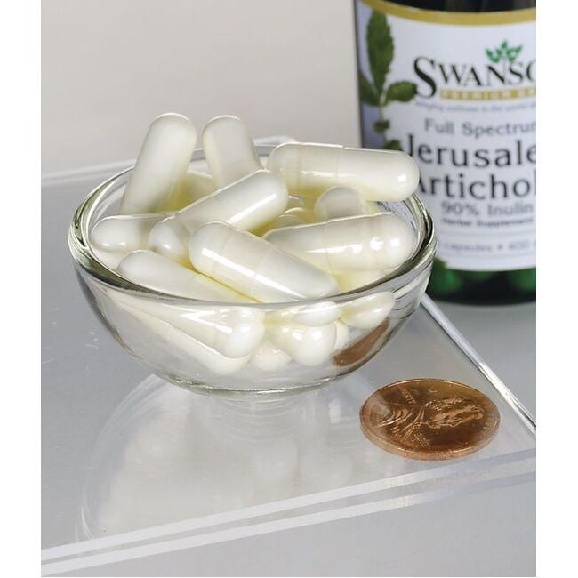 Un bol contenant Swanson's Prebiotic Jerusalem Artichoke - 400 mg 60 capsules, un supplément à base de plantes pour la santé digestive.