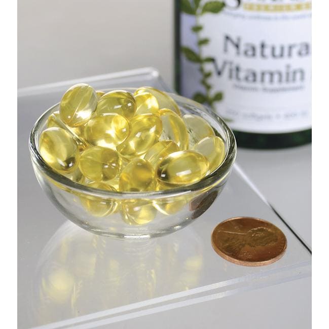 SwansonVitamine E - Naturelle 400 UI 250 capsules molles dans un bol, fournissant un soutien antioxydant et favorisant la santé cardiovasculaire.