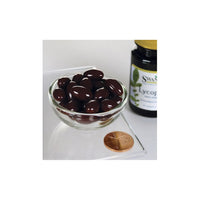 Vignette pour Lycopène 20 mg 60 sgels dans un bol à côté d'un pot de chocolat Swanson .