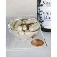Thumbnail for Swanson Yohimbe Bark - 75 mg 100 capsules in a glass bowl next to a penny.