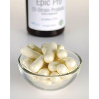 Vignette pour Un bol de pilules blanches à côté d'une bouteille de Swanson's Epic Pro 25-Strain Probiotic - 30 gélules végétales.