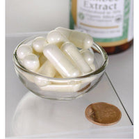 Vignette de Swanson's Bamboo Extract - 300 mg, un complément alimentaire dans un bol à côté d'une bouteille de Swanson's Bamboo Extract - 300 mg.