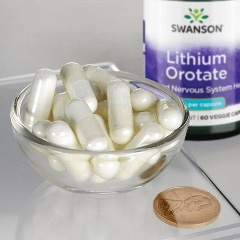 Swanson Orotate de lithium - 5 mg 60 gélules végétales dans un bol à côté d'une pièce de monnaie.